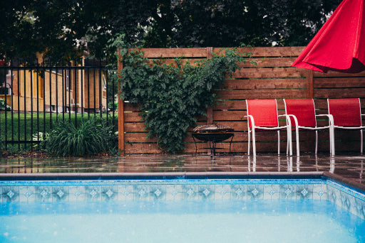rain-falls-on-clean-pool-and-deck-stock